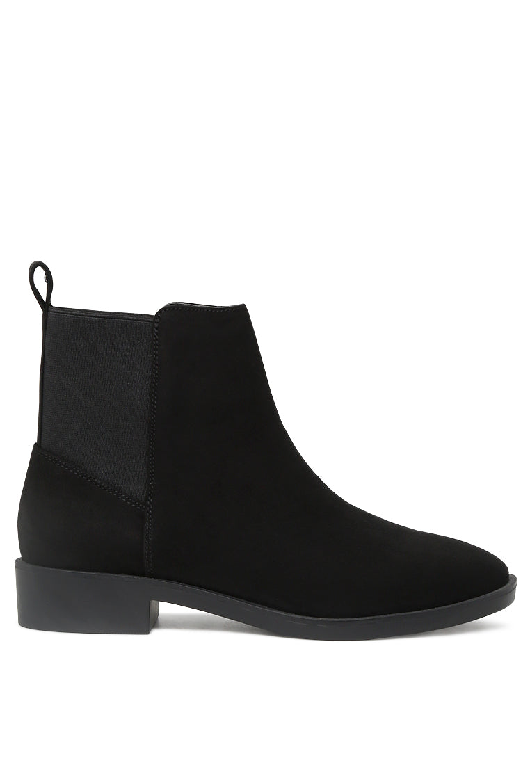 Chic Bunny Chelsea Boots with block heel and elasticated gussets, perfect for stylish outfits.