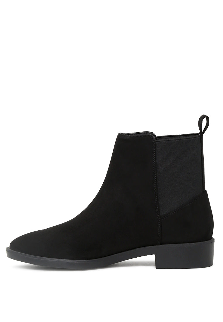 Chic Bunny Chelsea Boots with block heel and elasticated gussets, perfect for stylish outfits.