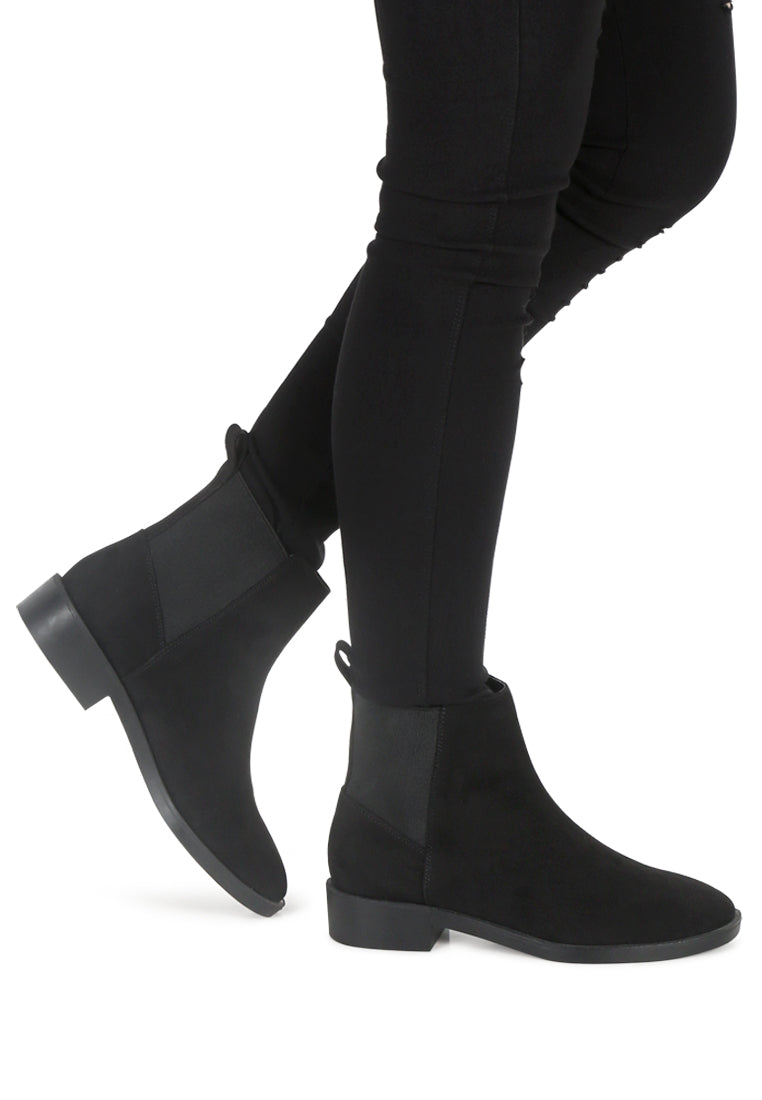 Chic Bunny Chelsea Boots with block heel and elasticated gussets, perfect for stylish outfits.