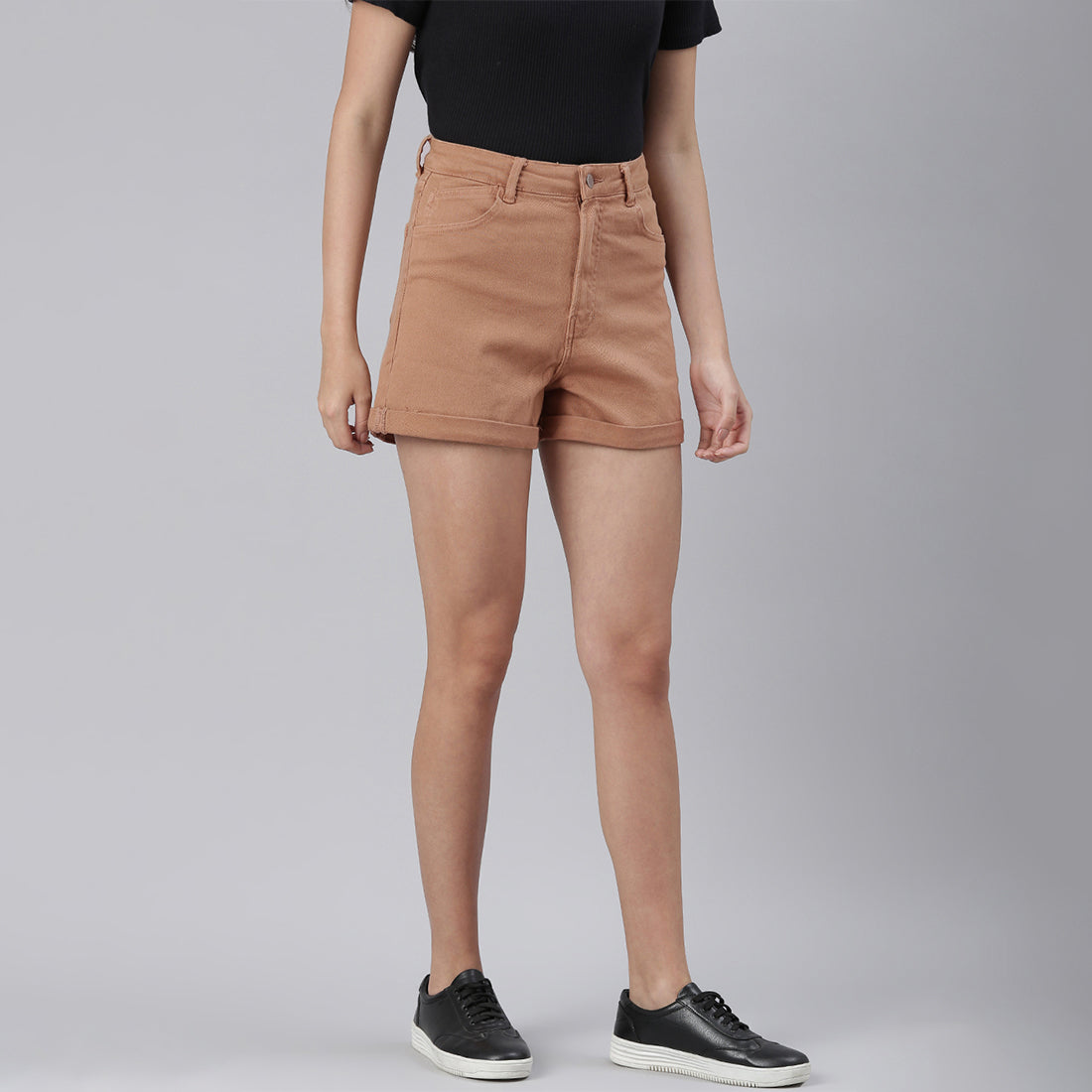Camel high waist shorts with upturned hem and pockets, showcasing a stylish summer look.