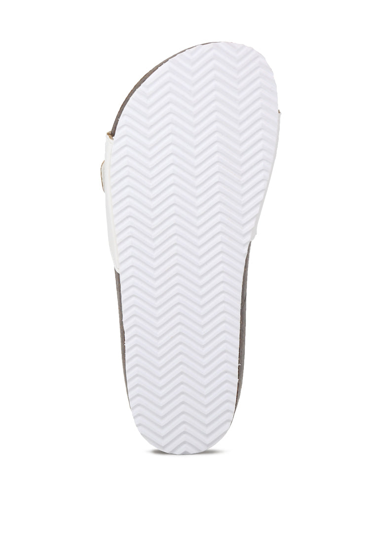 Candy Comfort Sliders featuring an adjustable toe strap, stylish open toe design, and flat heel for ultimate comfort.