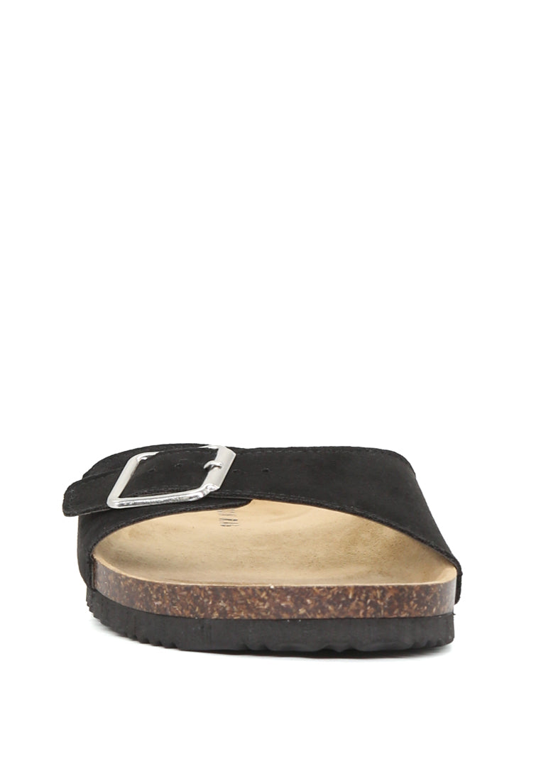 Candy Comfort Sliders featuring an adjustable toe strap, stylish open toe design, and flat heel for ultimate comfort.