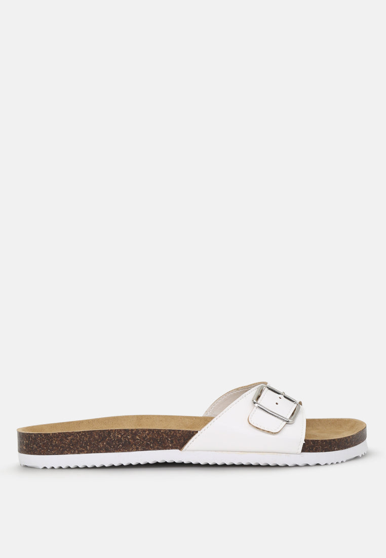 Candy Comfort Sliders featuring an adjustable toe strap, stylish open toe design, and flat heel for ultimate comfort.