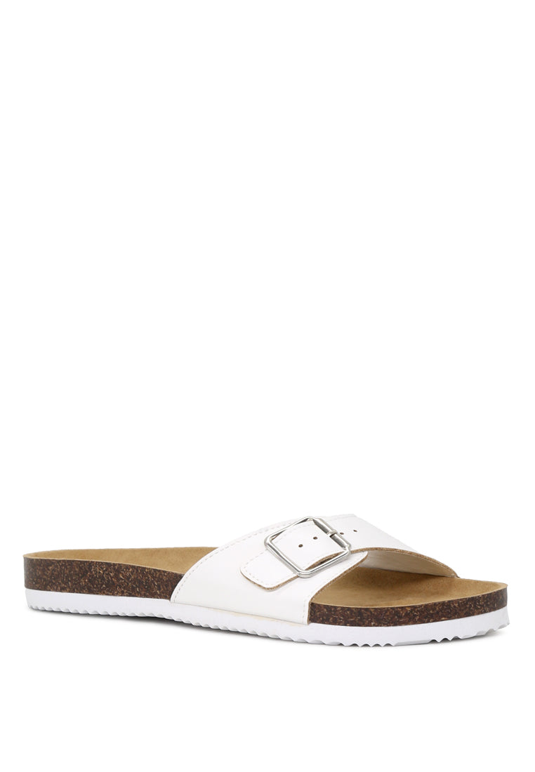 Candy Comfort Sliders featuring an adjustable toe strap, stylish open toe design, and flat heel for ultimate comfort.