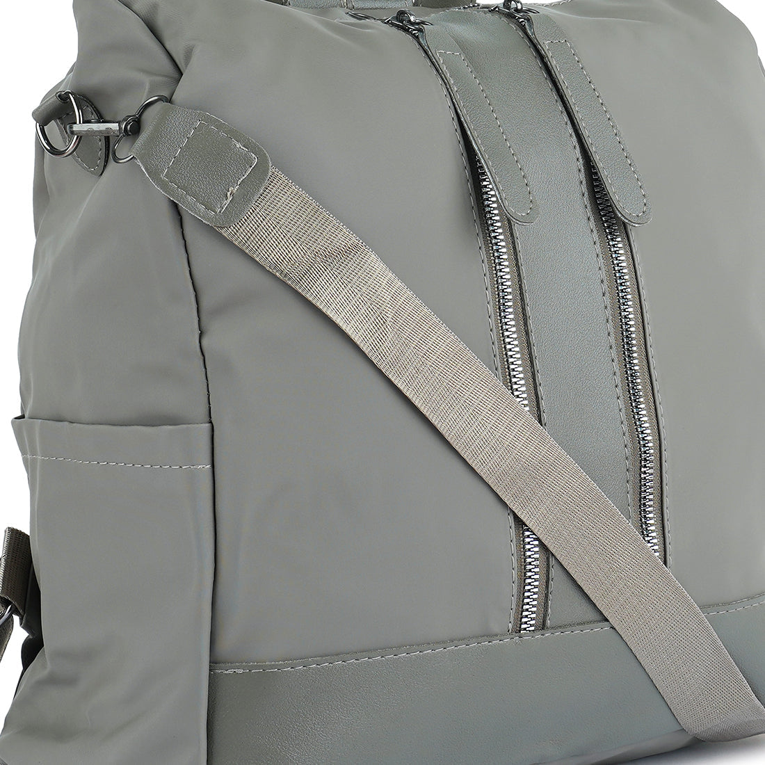 Carry All Small Backpack in synthetic material with multiple compartments and detachable shoulder strap.