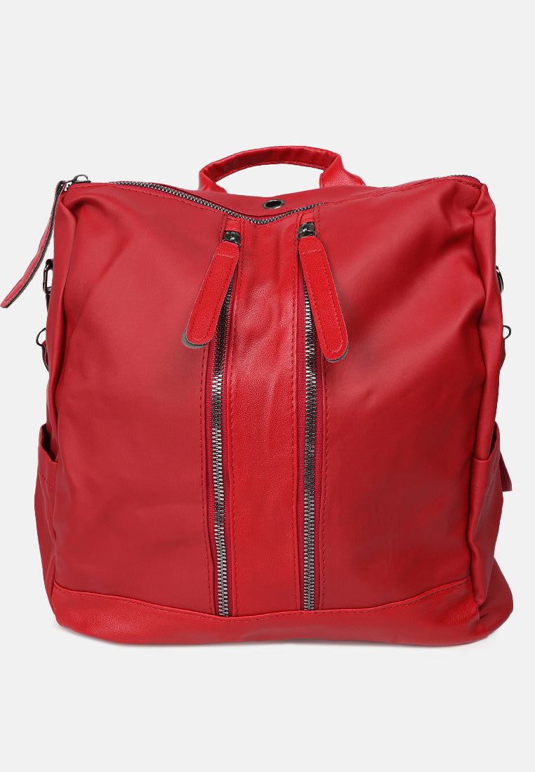 Carry All Small Backpack in synthetic material with multiple compartments and detachable shoulder strap.
