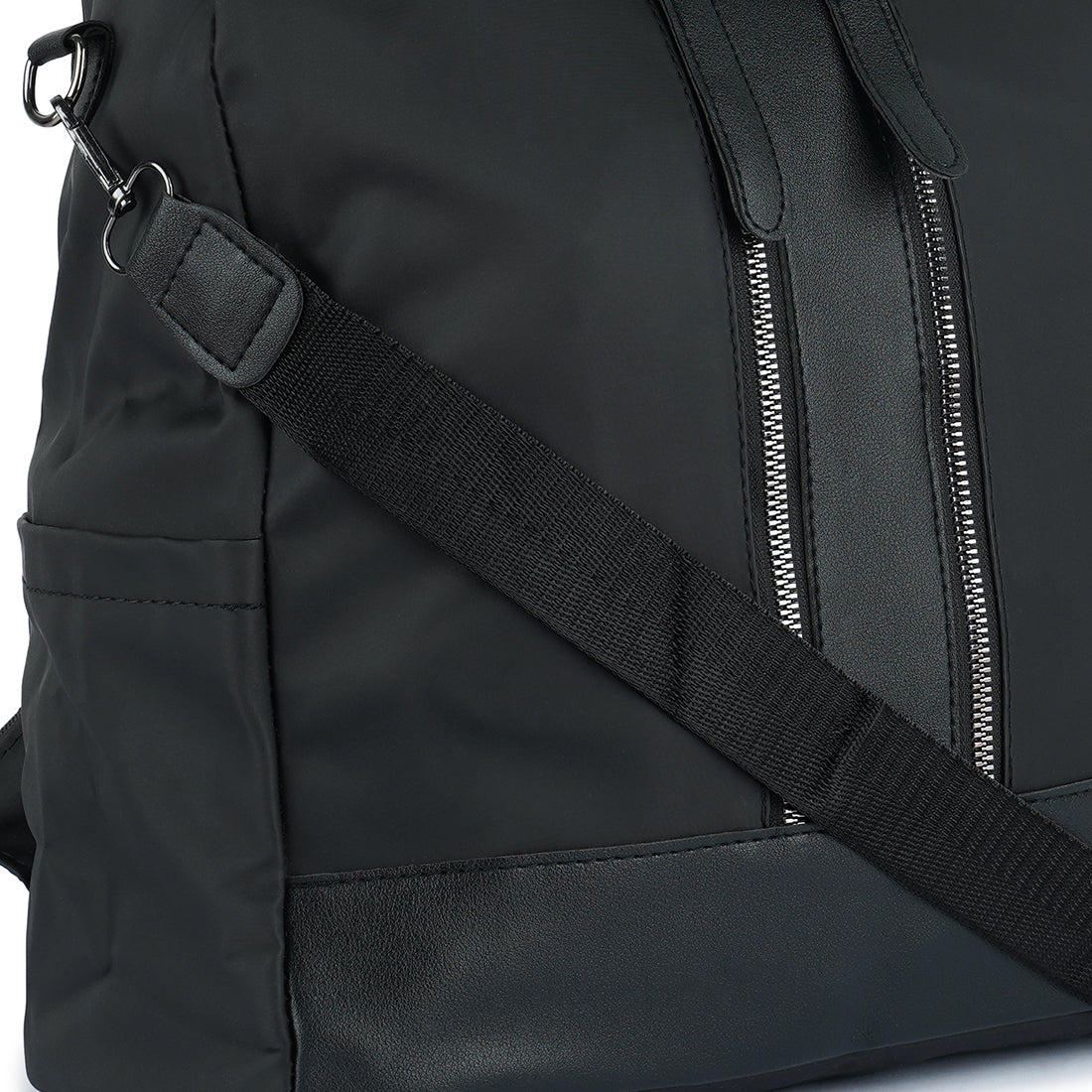 Carry All Small Backpack in synthetic material with multiple compartments and detachable shoulder strap.