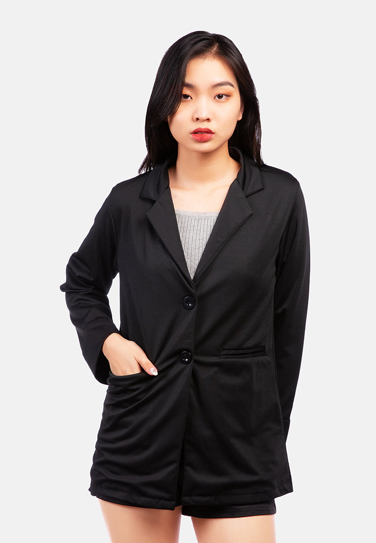 Casual oversized jacket in soft fall fabric with double-breasted design and two front pockets, perfect for spring wear.