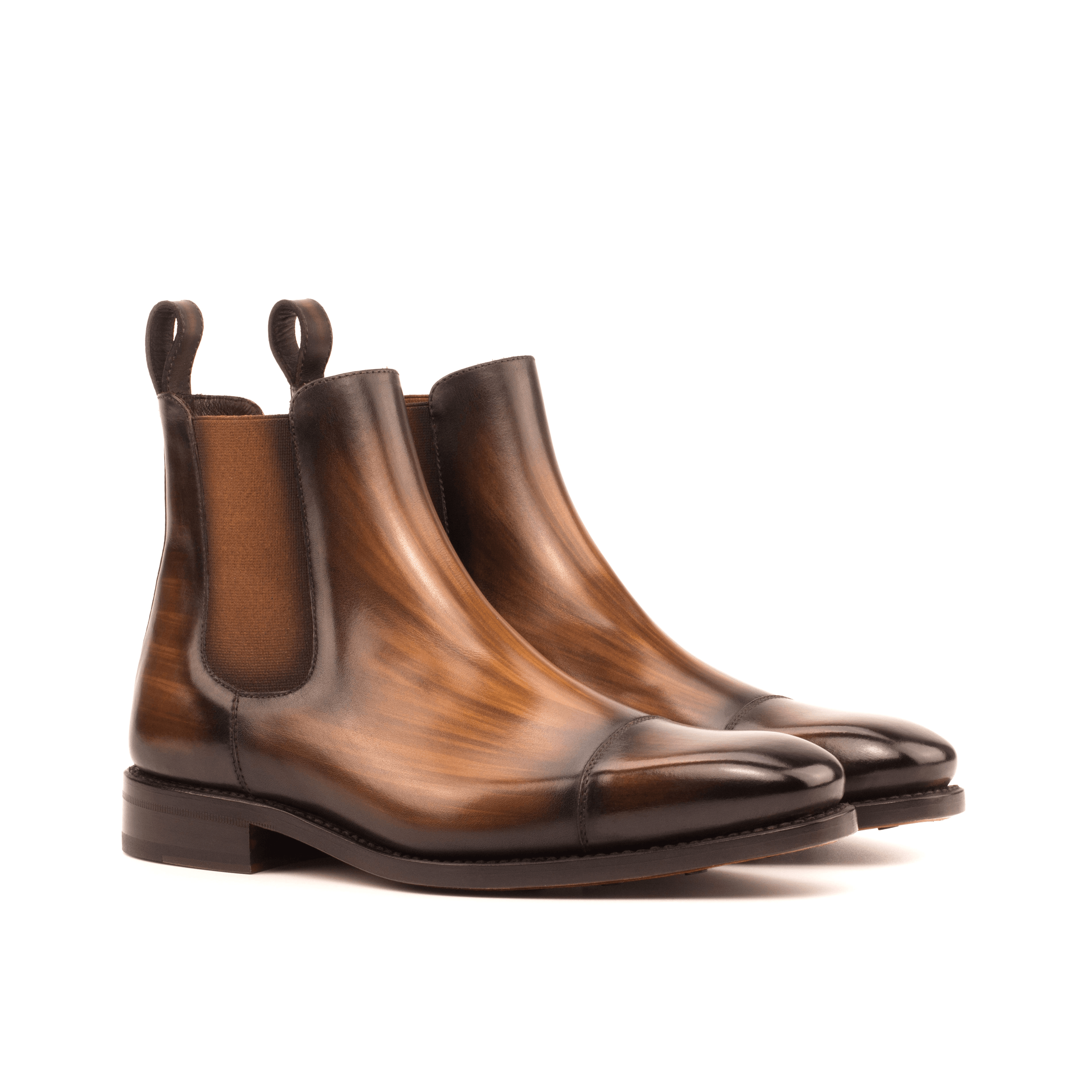 Chayton Patina Chelsea Boots II showcasing brown crust patina leather, elegant design, and dark red Goodyear leather sole.
