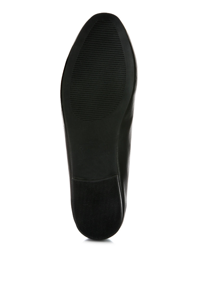 A pair of stylish chunky metal chain faux leather loafers featuring an almond toe and slip-on design, perfect for daily wear.