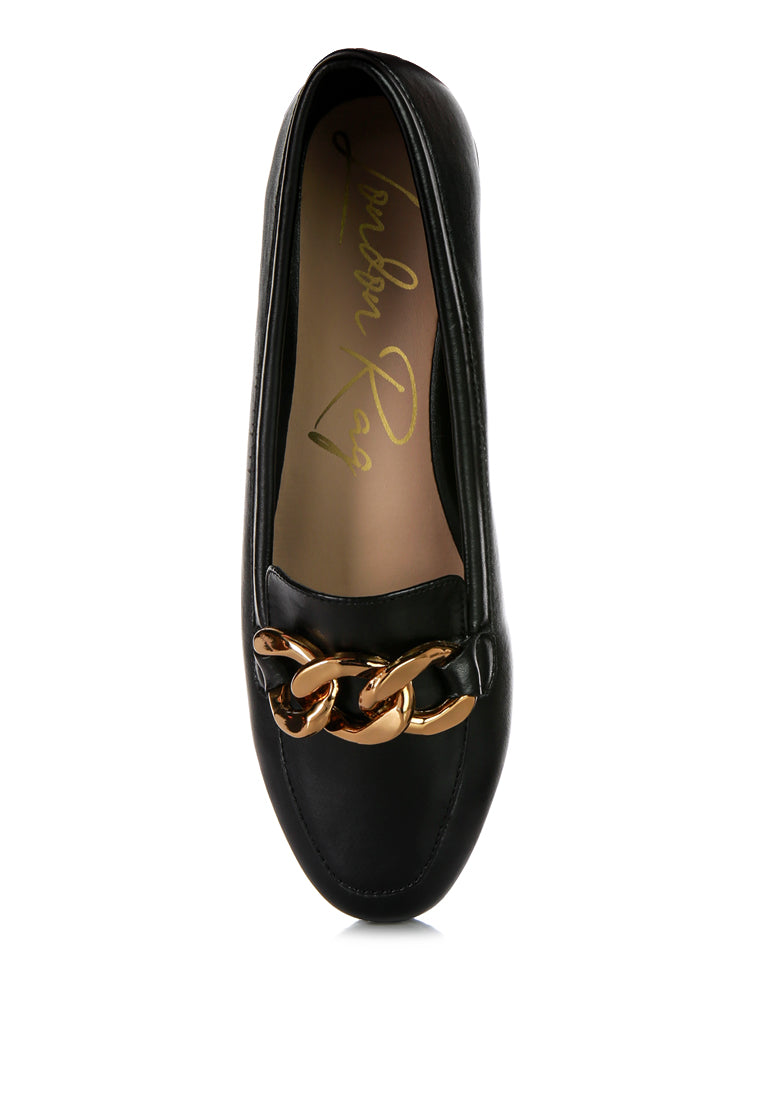 A pair of stylish chunky metal chain faux leather loafers featuring an almond toe and slip-on design, perfect for daily wear.