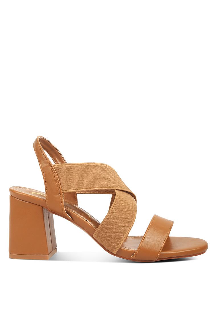 A pair of Comfortable Straps Block Heel Sandals featuring soft padded innersole, elasticated thick straps, and stylish block heels.
