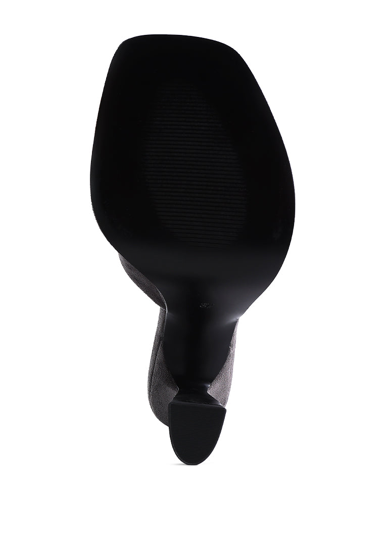 A pair of stylish Copyme Micro Suede Slip On Spool Heel Sandals featuring a soft microfiber upper and mid-high spool heels.