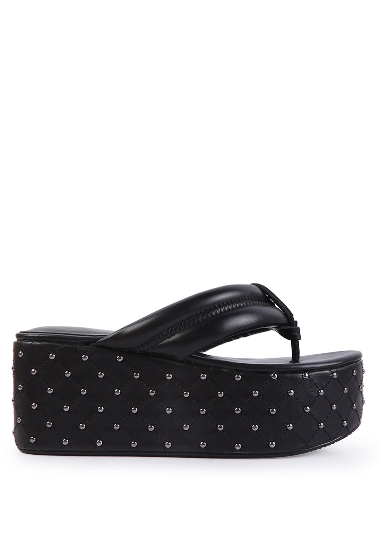 Cupcake Quilted Rhinestone Platform Sandals featuring a quilted design, cushioned straps, and metal ball studs on a chunky platform.