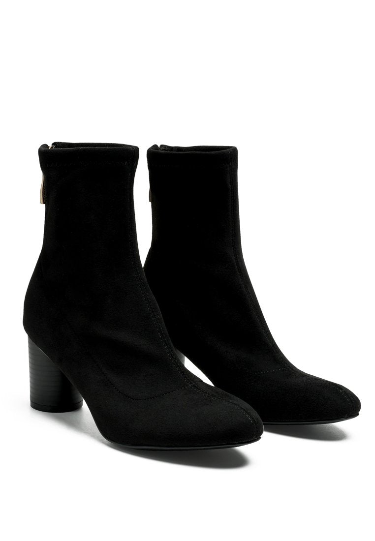 Emerson Micro Suede Ankle Boots featuring a stylish faux leather design with a block heel and back zipper.