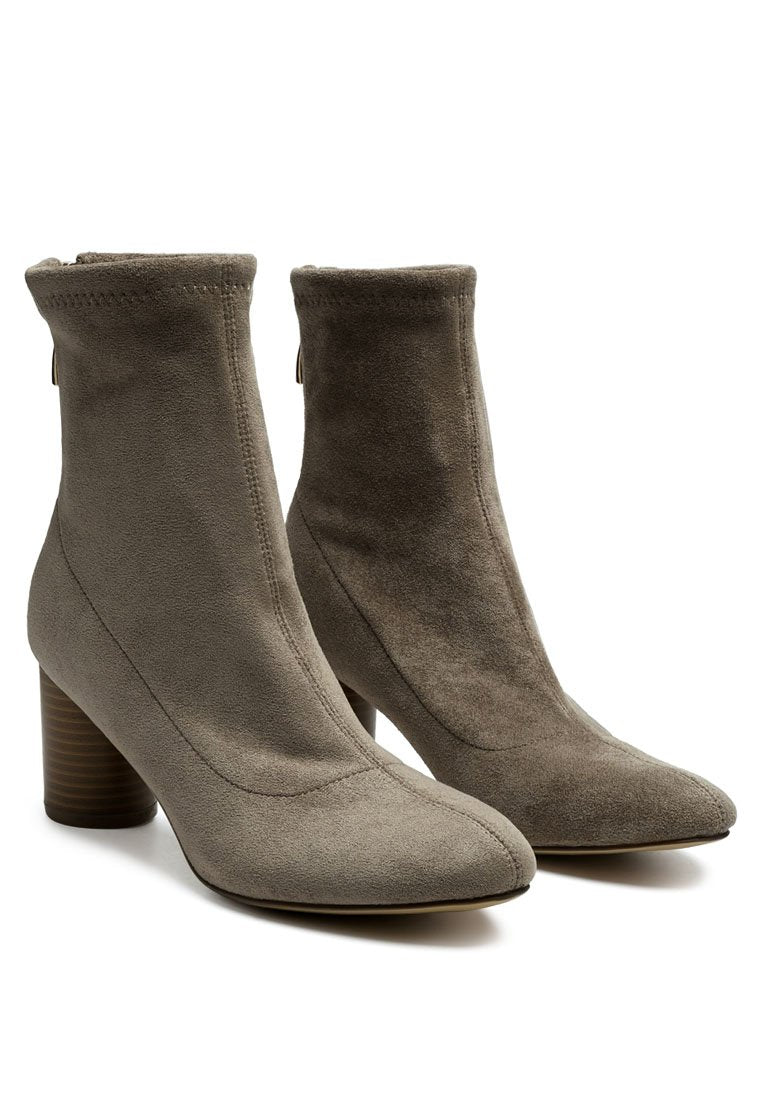 Emerson Micro Suede Ankle Boots featuring a stylish faux leather design with a block heel and back zipper.