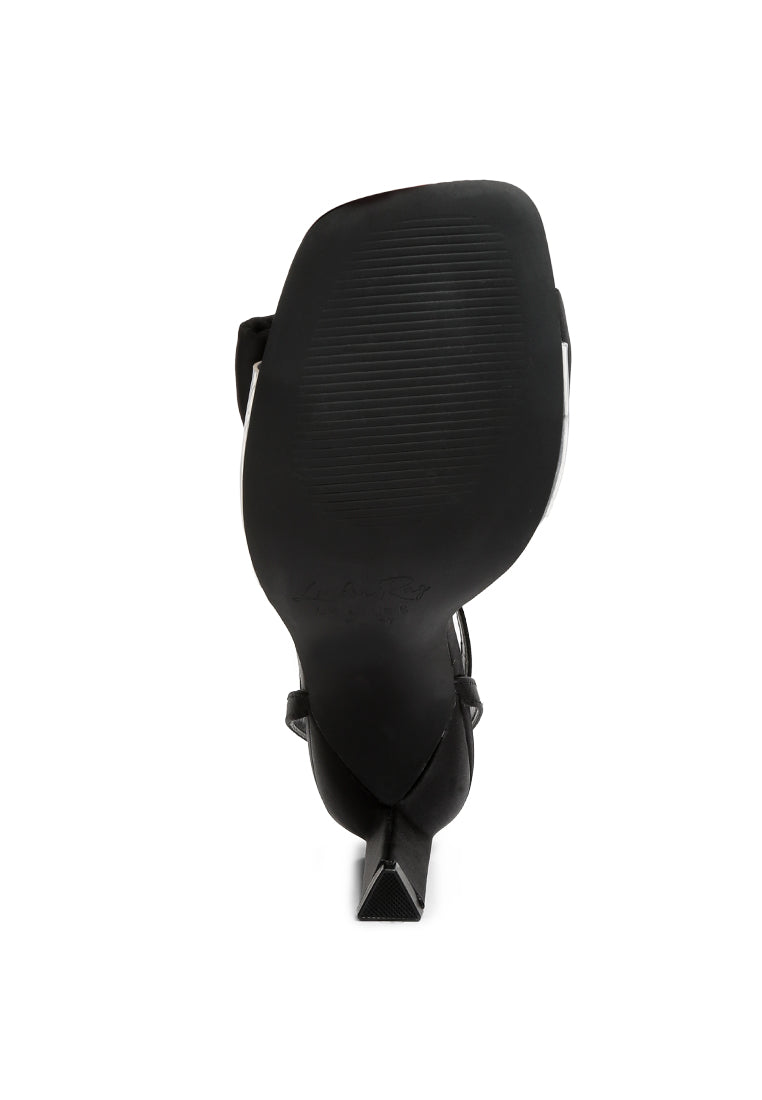 Elegant Etherium Bow Heeled Sandals with oversized bow and pin buckle fastening, crafted from satin with a durable TPR sole.