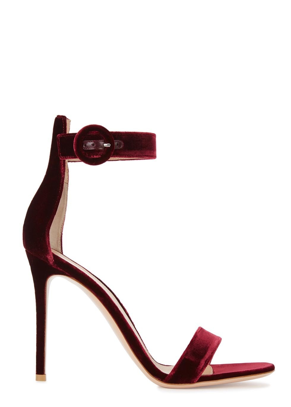 Stylish European and American women's sandals with ankle buckle, featuring a slim heel and round toe design, perfect for various occasions.