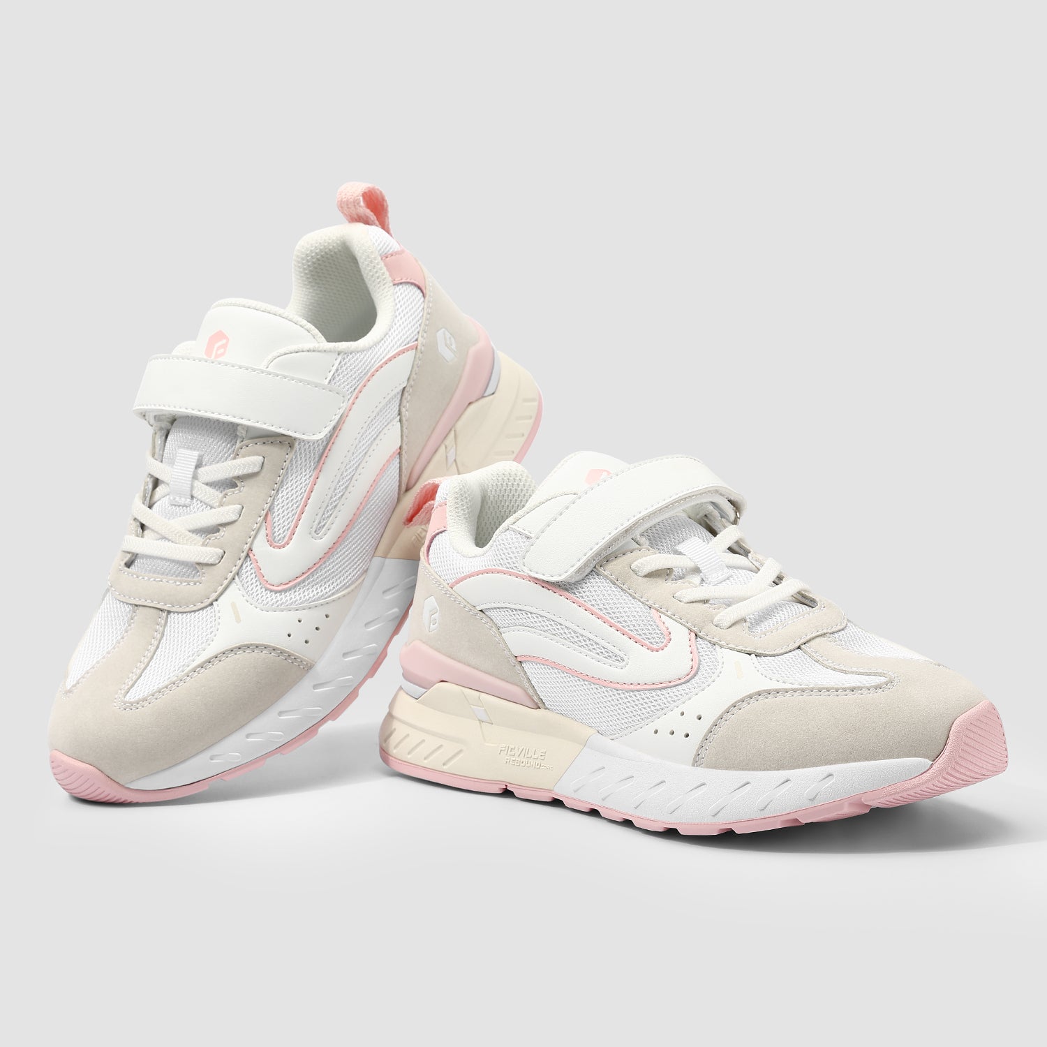 FitVille Women's Rebound Core V2 shoes featuring a light pink accent, Velcro strap closure, and a wide toe box for comfort.