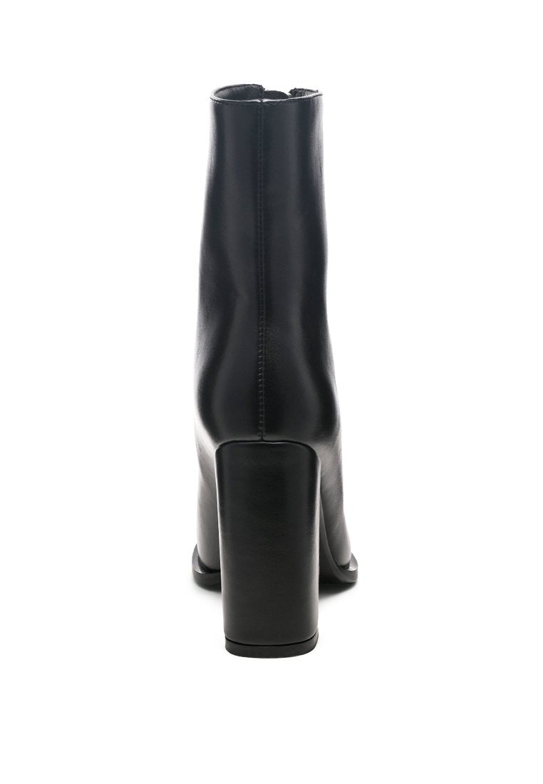 Flower Blade Boot featuring a square toe design, front zipper, and metallic sling detail, perfect for stylish outings.