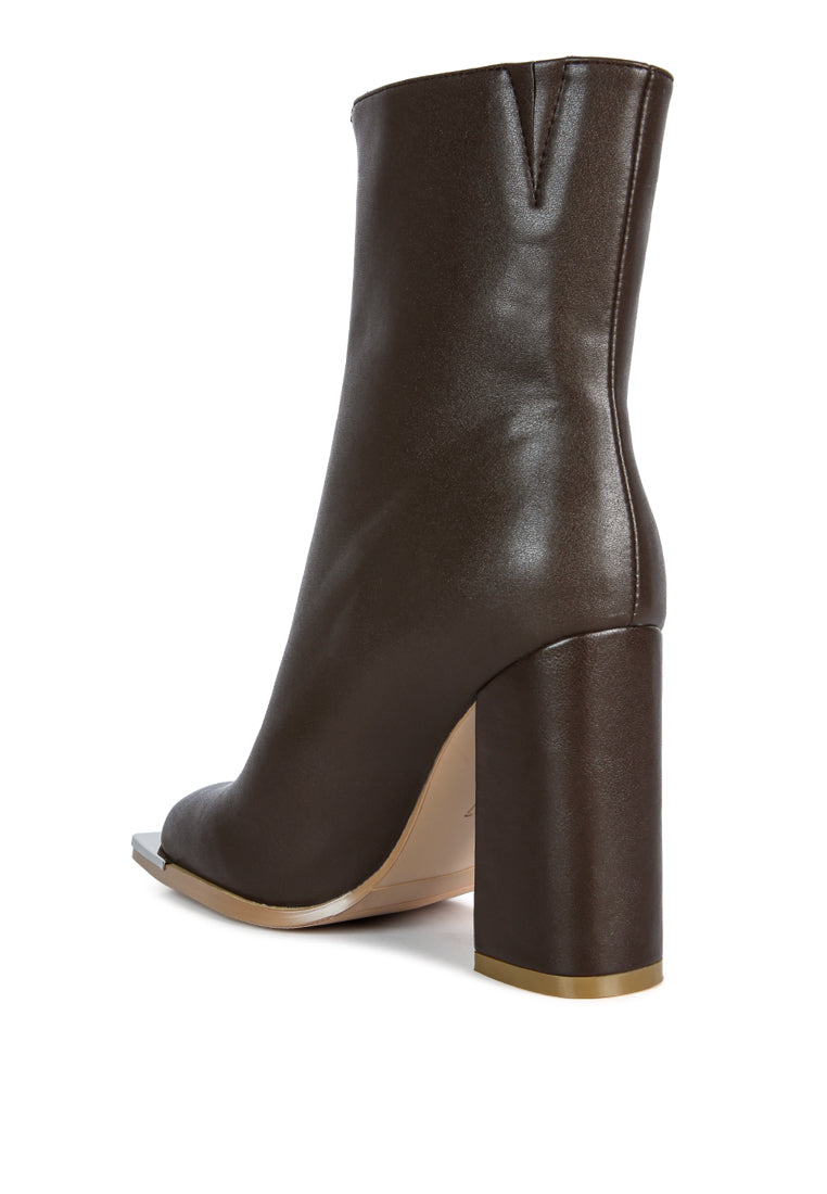 Flower Blade Boot featuring a square toe design, front zipper, and metallic sling detail, perfect for stylish outings.