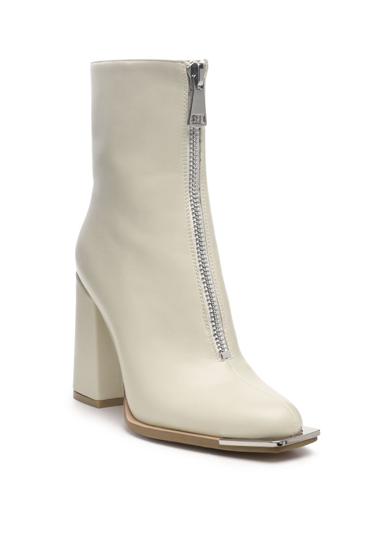 Flower Blade Boot featuring a square toe design, front zipper, and metallic sling detail, perfect for stylish outings.