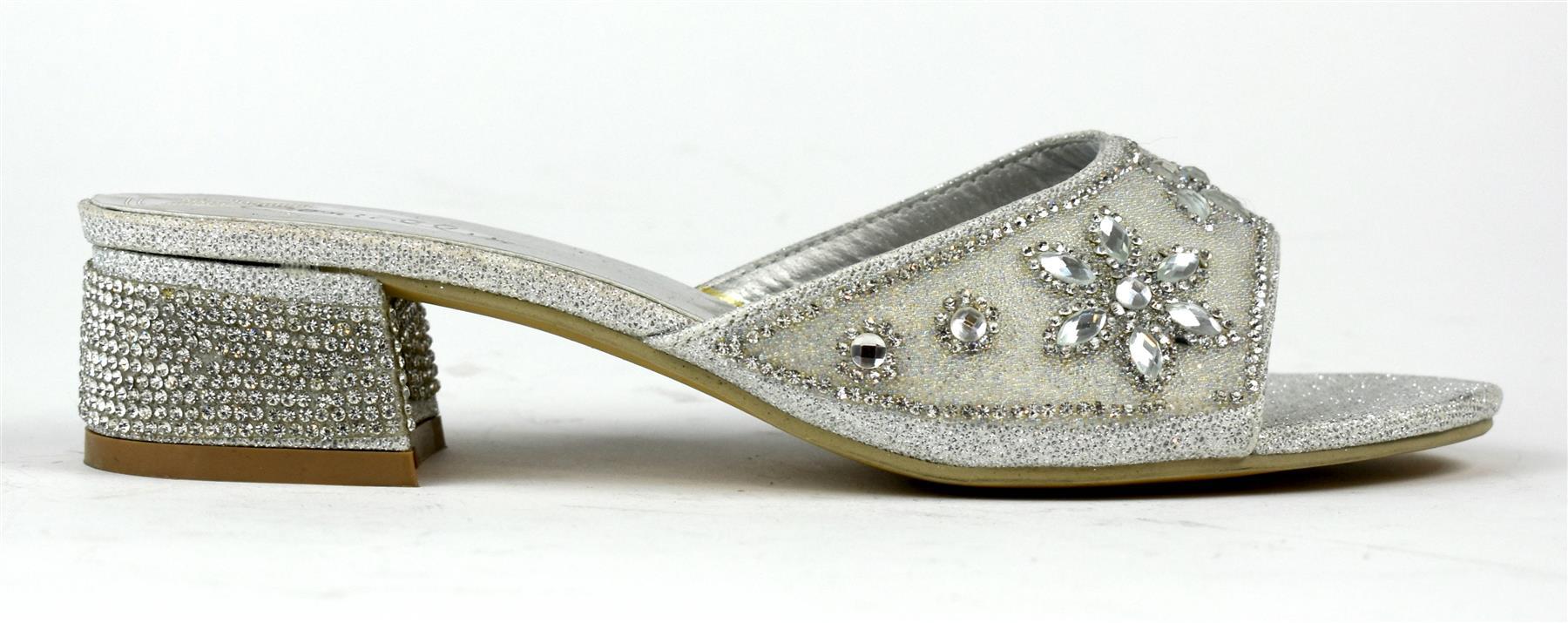Elegant silver block heel adorned with flower stones, perfect for stylish occasions.