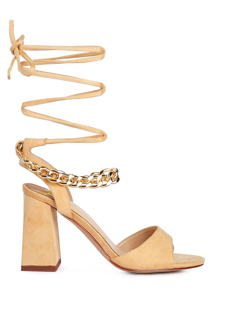 Gone Gurl Metal Chain Lace Up Sandals featuring a stylish lace-up design and gold chain detail on a block heel.
