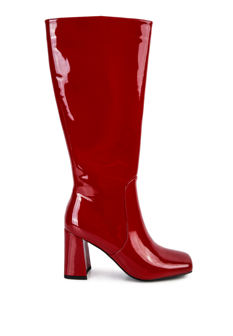 A pair of stylish Hypnotize Patent PU Block Heeled Calf Boots featuring a square toe, mid block heel, and side zipper opening.