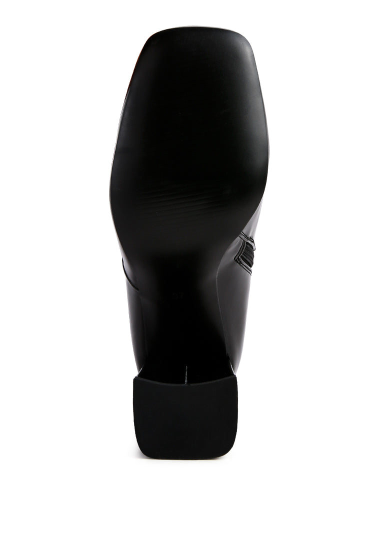 A pair of stylish Hypnotize Patent PU Block Heeled Calf Boots featuring a square toe, mid block heel, and side zipper opening.