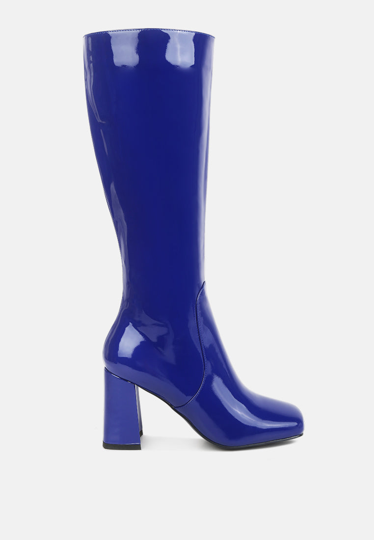 A pair of stylish Hypnotize Patent PU Block Heeled Calf Boots featuring a square toe, mid block heel, and side zipper opening.