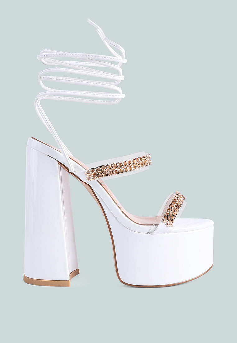 Indulgence Metal Chain Lace Up Chunky Sandals featuring gold chain details and a high platform design, perfect for parties and weddings.