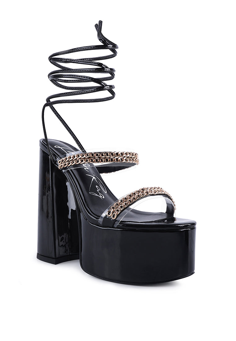 Indulgence Metal Chain Lace Up Chunky Sandals featuring gold chain details and a high platform design, perfect for parties and weddings.