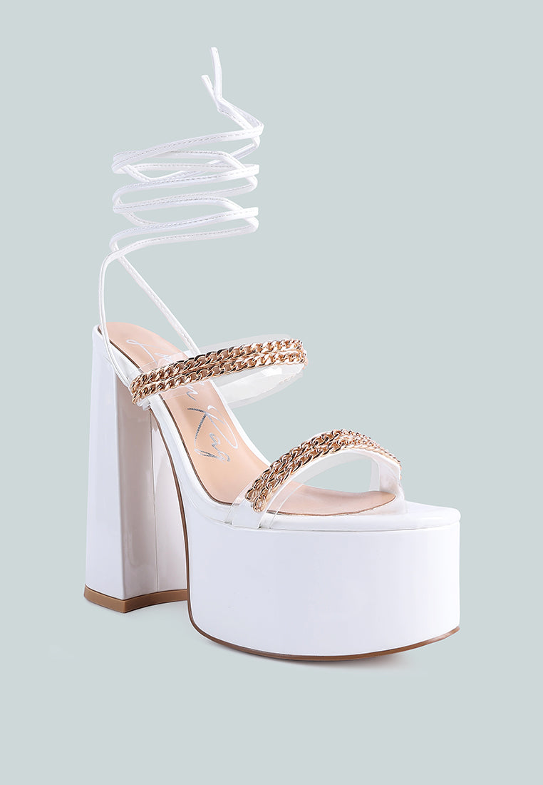 Indulgence Metal Chain Lace Up Chunky Sandals featuring gold chain details and a high platform design, perfect for parties and weddings.
