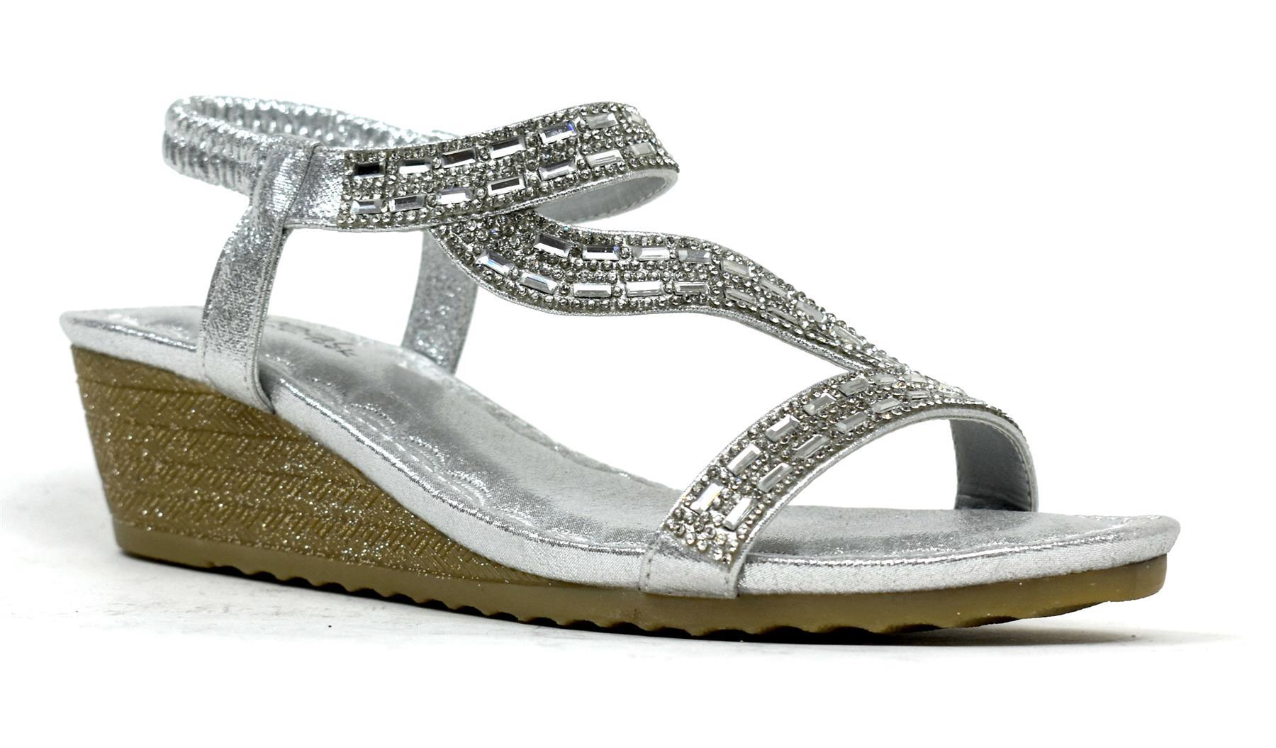 LSA-8026 Silver shoes featuring a sleek synthetic PU upper and flexible TPR sole, perfect for stylish comfort.