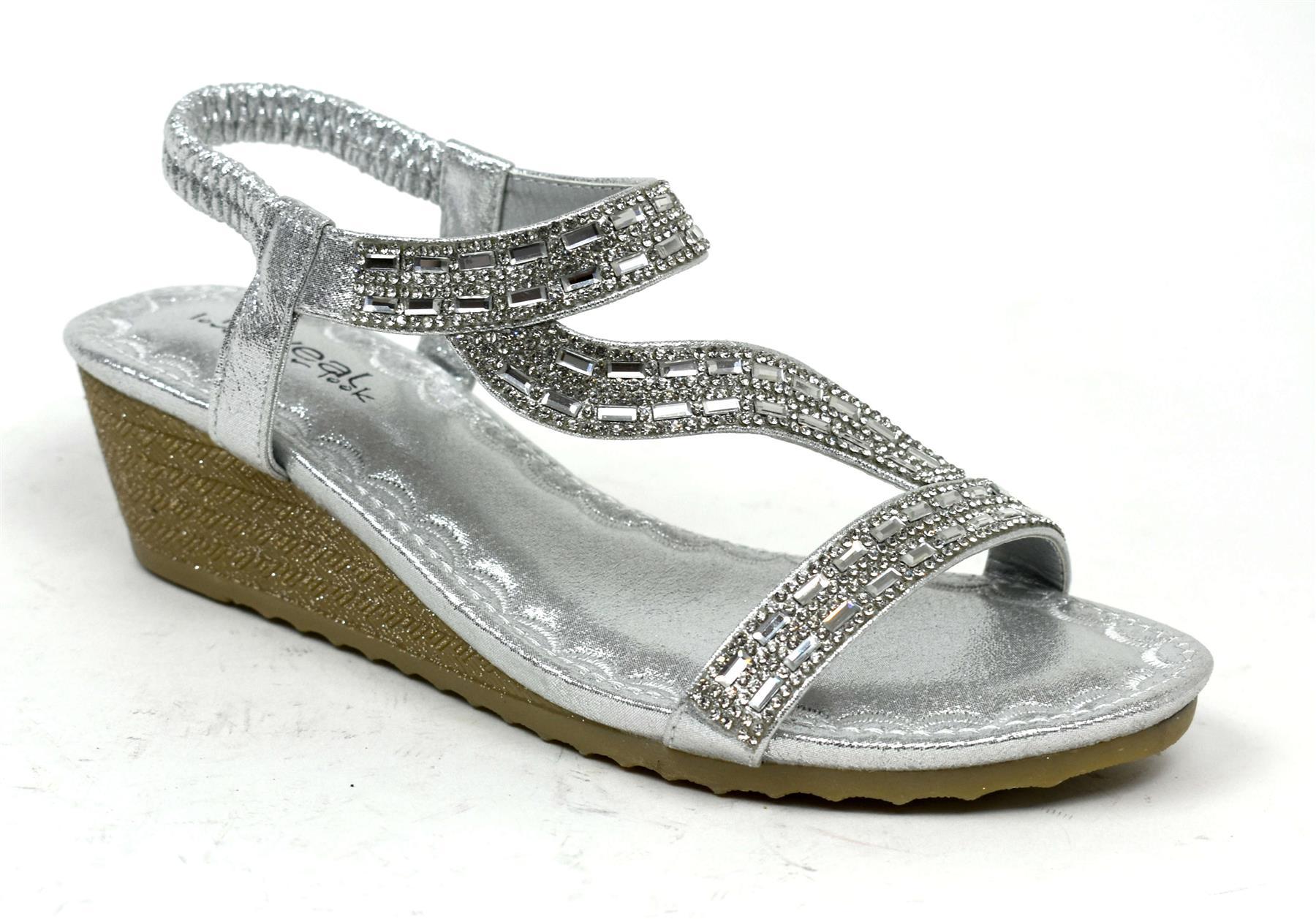 LSA-8026 Silver shoes featuring a sleek synthetic PU upper and flexible TPR sole, perfect for stylish comfort.
