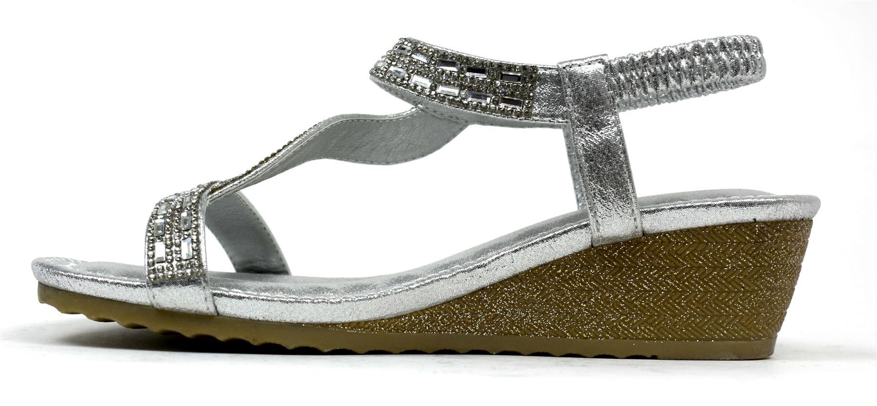 LSA-8026 Silver shoes featuring a sleek synthetic PU upper and flexible TPR sole, perfect for stylish comfort.