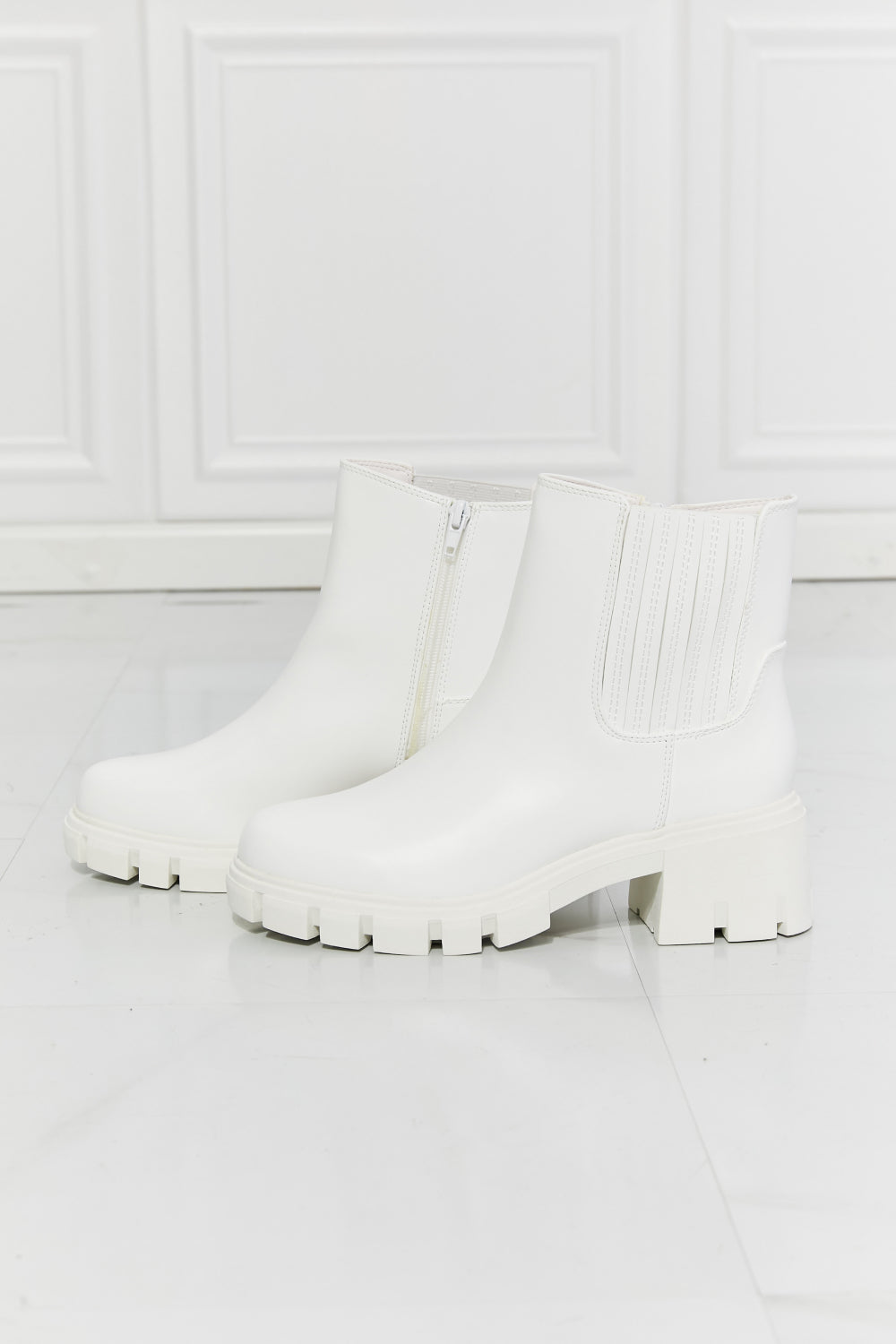 MMShoes What It Takes Lug Sole Chelsea Boots in White, featuring faux patent leather, block heel, and stretchy side panel for easy wear.