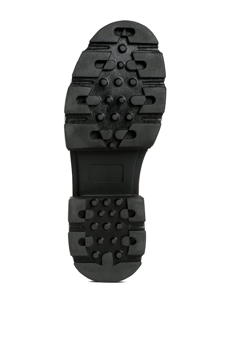 A pair of Oklyn Horsebit Embellished Chunky Platform Loafers in faux leather, featuring a closed rounded toe and stylish horsebit detail.