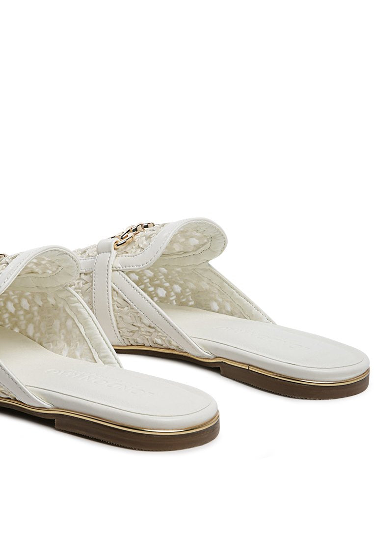 Ophelia Lattice Edge Woven Flat Mules featuring a decorative strap and round toe design, perfect for casual wear.
