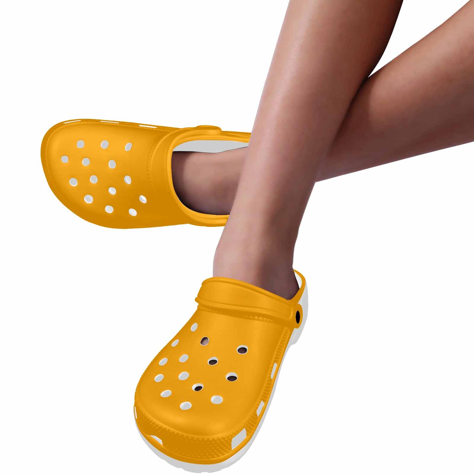 Orange custom print adults clogs made from lightweight EVA material with ventilation ports and pivoting heel straps.
