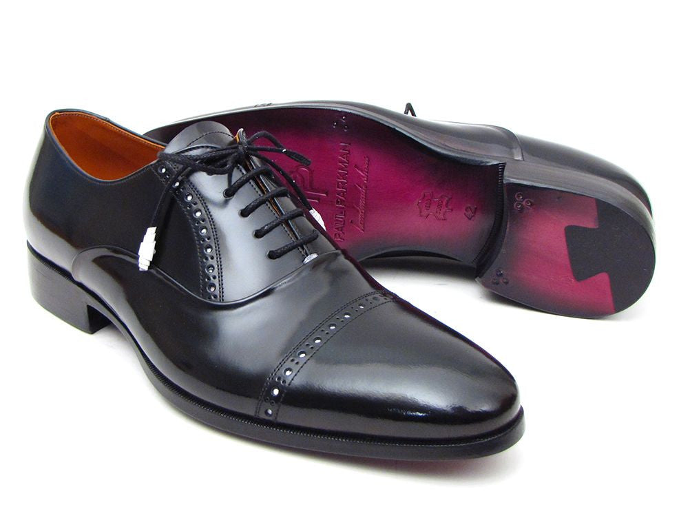 Paul Parkman Captoe Oxfords in black polished leather with white perforations and purple sole, showcasing elegant design and craftsmanship.