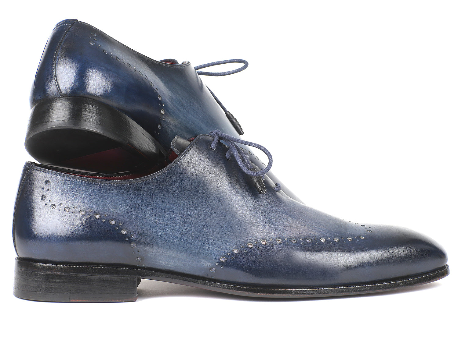 Paul Parkman Men's Navy Burnished Wingtip Oxfords showcasing unique hand-painted leather and elegant wingtip design.