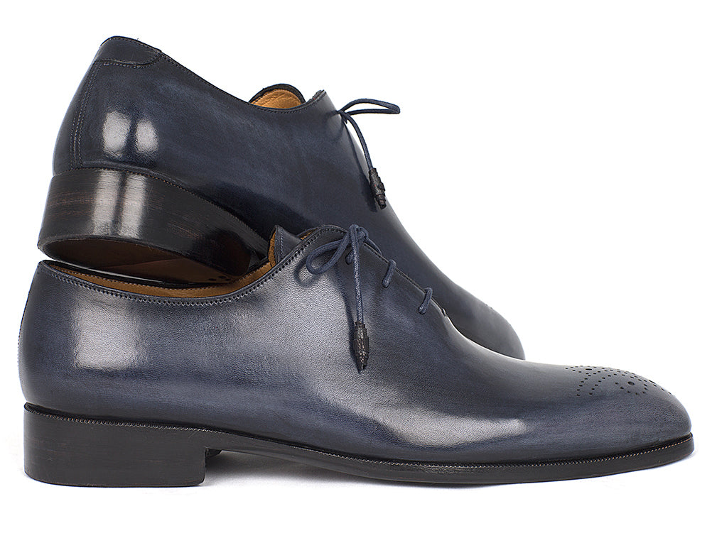 Paul Parkman Men's Navy Wholecut Oxfords showcasing hand-painted calfskin upper and unique purple burnished leather sole.