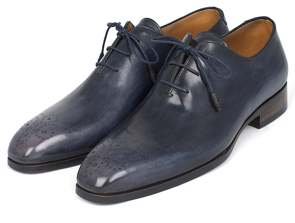 Paul Parkman Men's Navy Wholecut Oxfords showcasing hand-painted calfskin upper and unique purple burnished leather sole.