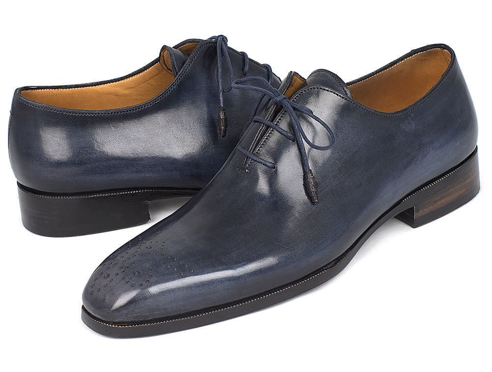 Paul Parkman Men's Navy Wholecut Oxfords showcasing hand-painted calfskin upper and unique purple burnished leather sole.