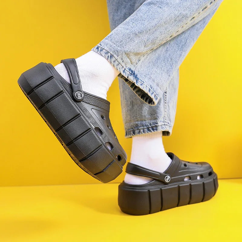 A pair of stylish Sexikinis Platform Slippers in green, black, and white, perfect for summer beach outings.