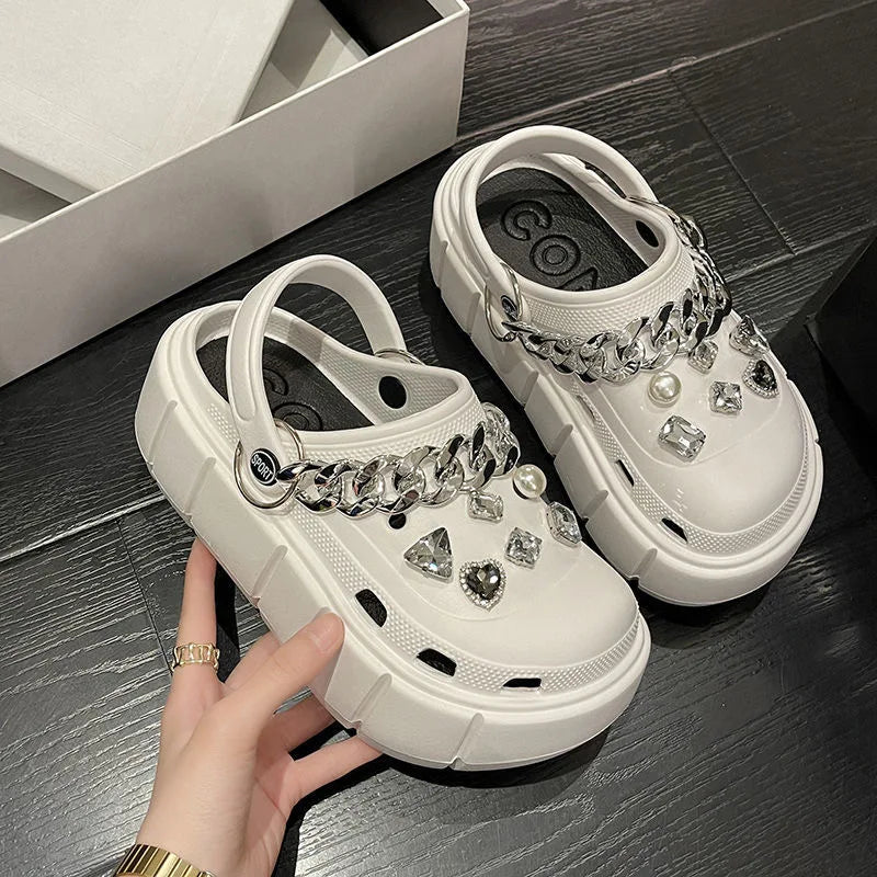 A pair of stylish Sexikinis Platform Slippers in green, black, and white, perfect for summer beach outings.