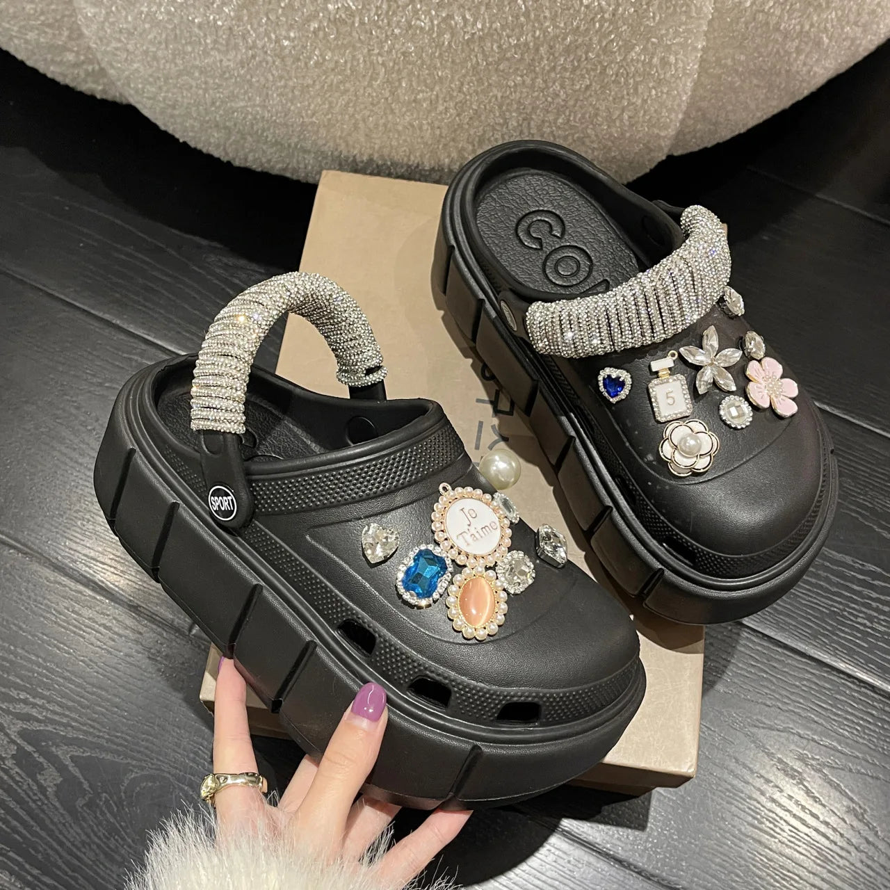 A pair of stylish Sexikinis Platform Slippers in green, black, and white, perfect for summer beach outings.