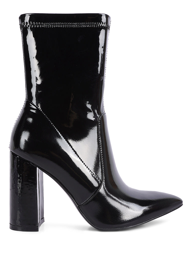 Pluto Block Heel Stiletto Ankle Boot featuring a sleek design with a side zipper and block heel, perfect for stylish women.
